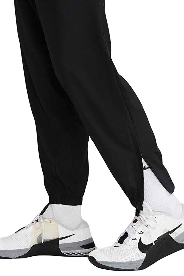 M NK DF FORM PANT TPR BLACK Man 063