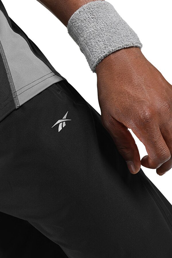 Reebok Id Run Pants Черный Мужчина Спортивные Брюки