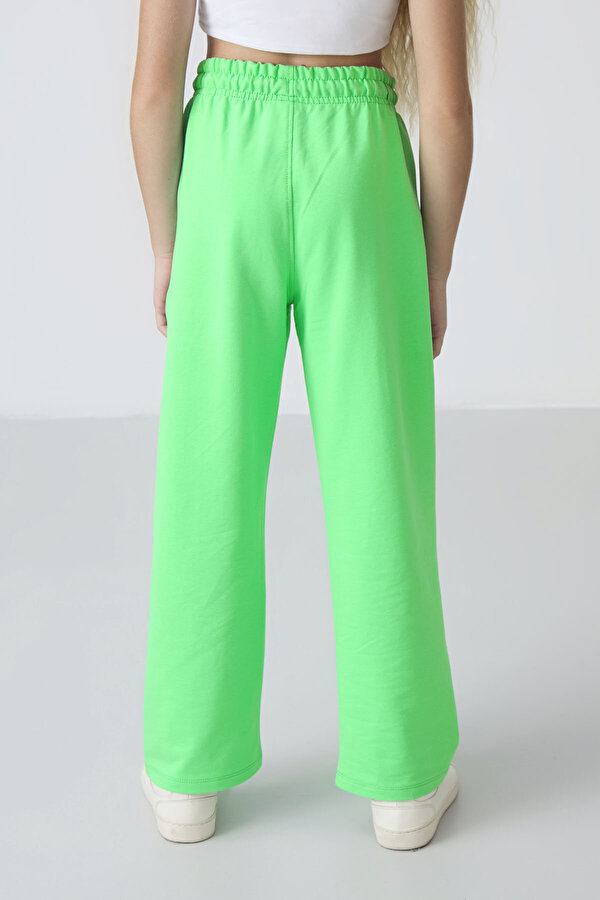 TOMMYLIFE Neon Yeşil Cepli Ön Dikiş Detaylı Geniş Paça Kız Çocuk Eşofman Altı -75144