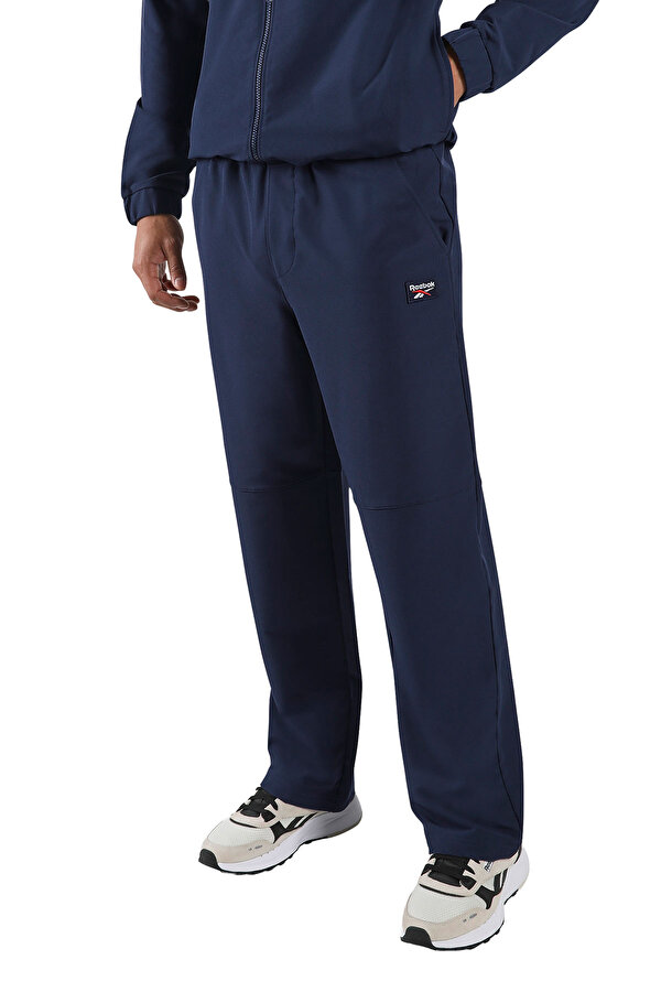 Reebok REECE 4WAY STRETCH PANT NAVY BLUE Man 063