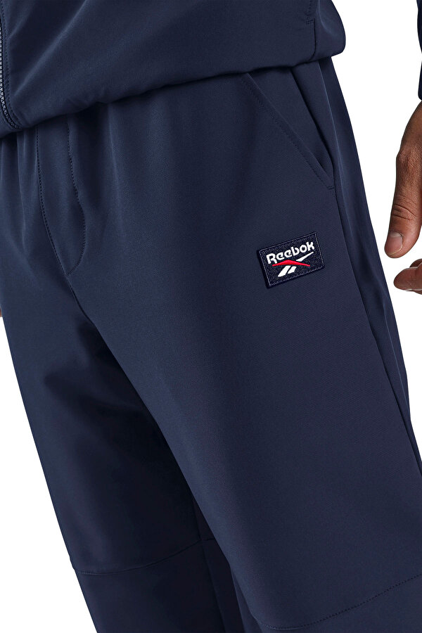 Reebok REECE 4WAY STRETCH PANT NAVY BLUE Man 063