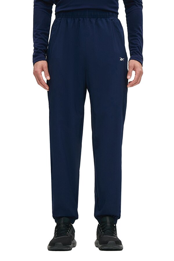 Reebok ID TRAIN WOVEN PANTS NAVY BLUE Man 063