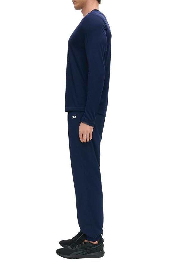 Reebok ID TRAIN WOVEN PANTS NAVY BLUE Man 063
