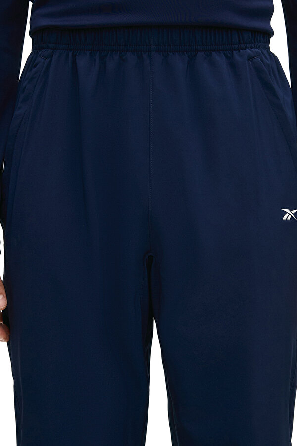 Reebok ID TRAIN WOVEN PANTS NAVY BLUE Man 063