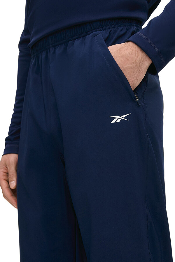 Reebok ID TRAIN WOVEN PANTS NAVY BLUE Man 063